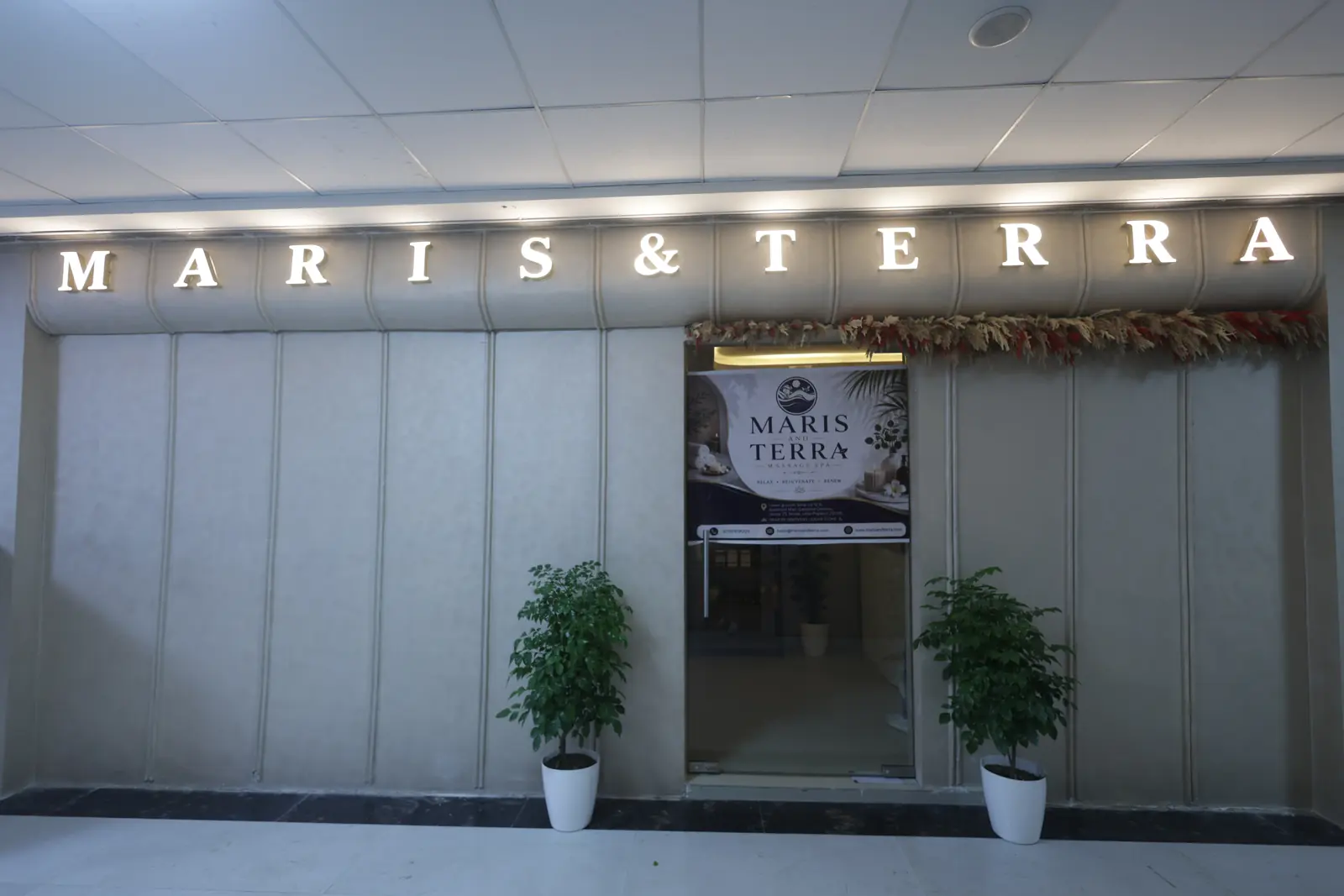 Illuminated MARIS & TERRA shopfront on the lower ground floor of Spectrum Mall, Sector 75, Noida